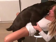 Beautiful blonde and her sex-crazed dog