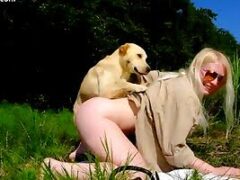Outdoor sex between beautiful blonde and small dog