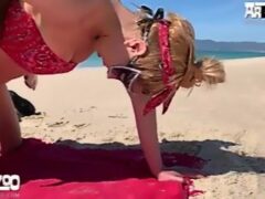 Sexy blonde enjoys fucking her dog on the beach